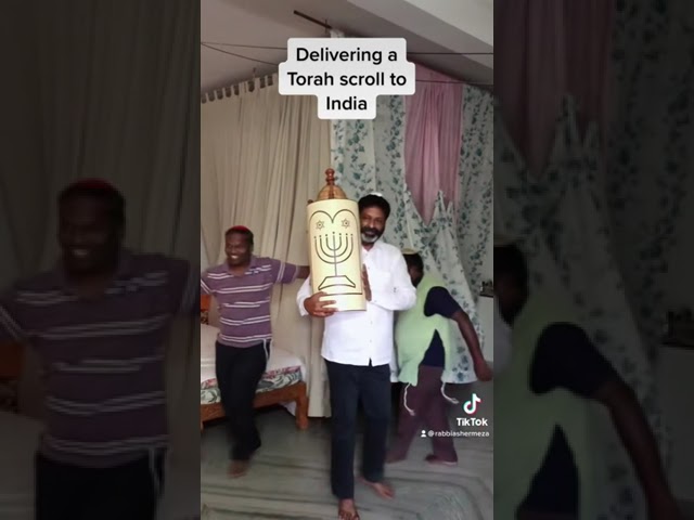 Delivering a Torah scroll to India